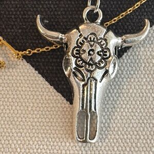 Cow skull silver tone necklace with bead detail on chain